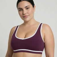 Woman wearing seamless sculpt activewear set with high waist leggings and supportive sports bra designed for gym, yoga, and athleisure wear.