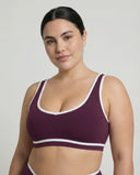 Woman wearing seamless sculpt activewear set with high waist leggings and supportive sports bra designed for gym, yoga, and athleisure wear.