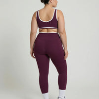 Woman wearing seamless sculpt activewear set with high waist leggings and supportive sports bra designed for gym, yoga, and athleisure wear.