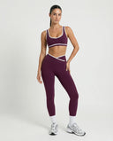 Woman wearing seamless sculpt activewear set with high waist leggings and supportive sports bra designed for gym, yoga, and athleisure wear.