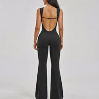 Ghost mannequin back view of the black backless bodysuit highlighting the open back cut and clean strap detail.