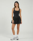 Front view of black balloon mini dress with sculpting bodice and square neckline on ghost mannequin.