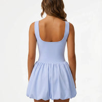 Ghost mannequin back view of light blue balloon hem dress displaying clean back panel and gathered skirt detail.