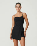 Women's black padel dress with built-in shorts displayed on ghost mannequin showing square neckline and spaghetti straps from the front.