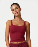Ghost mannequin front view of red sculpting sleeveless tank top with square neckline and wide straps.