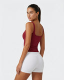 Ghost mannequin back view of red sleeveless tank top showing clean back panel and wide strap placement.