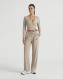 SEEN Essential women's brown yoga set with ribbed wrap crop top and wide leg pants displayed on ghost mannequin, front view.